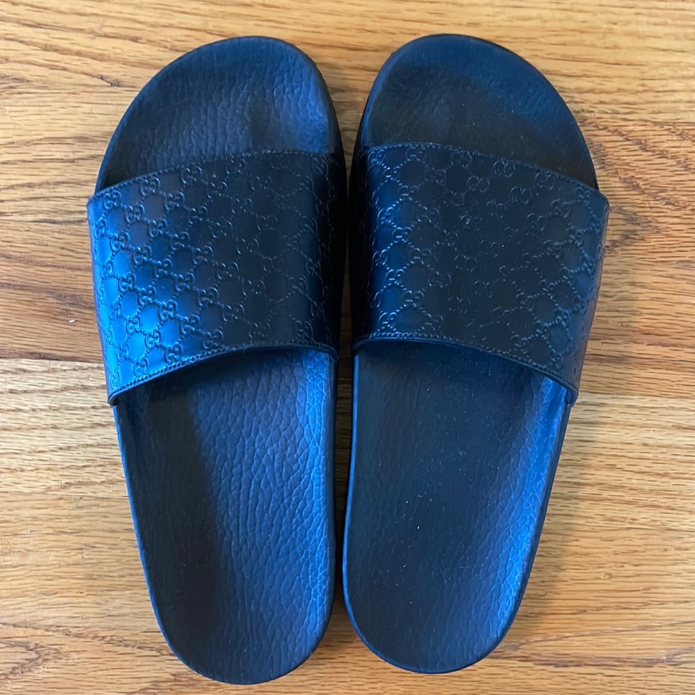 Women’s Gucci black slides